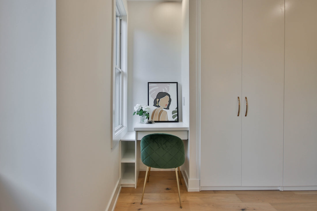 a room with a desk and a chair in it