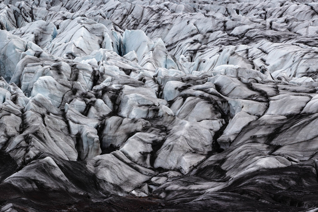 A large group of rocks that are covered in snow