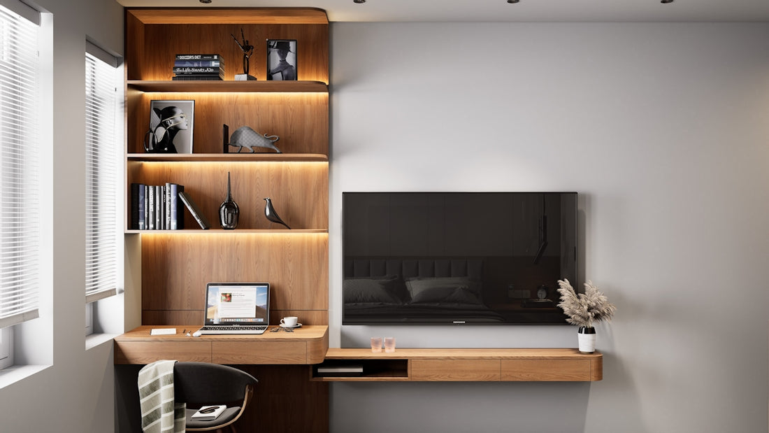 Modern office with wooden shelves and television.
